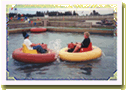 Jesse and his cousin Thorin playing <BR>bumper boats